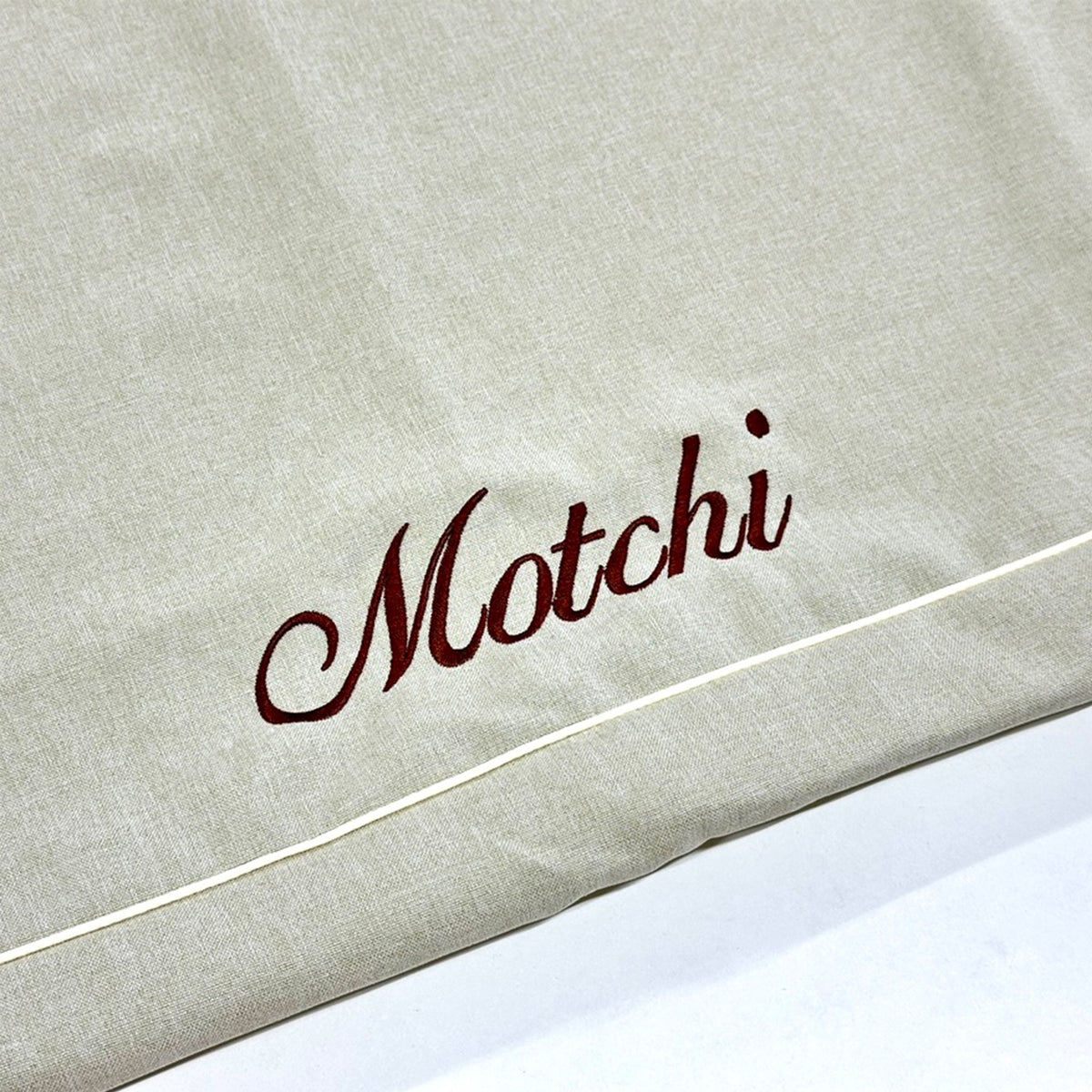 ANBERSO name embroidery detail on Japanese fabric