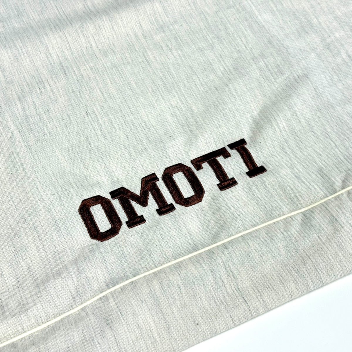 Close-up of ANBERSO custom name embroidery