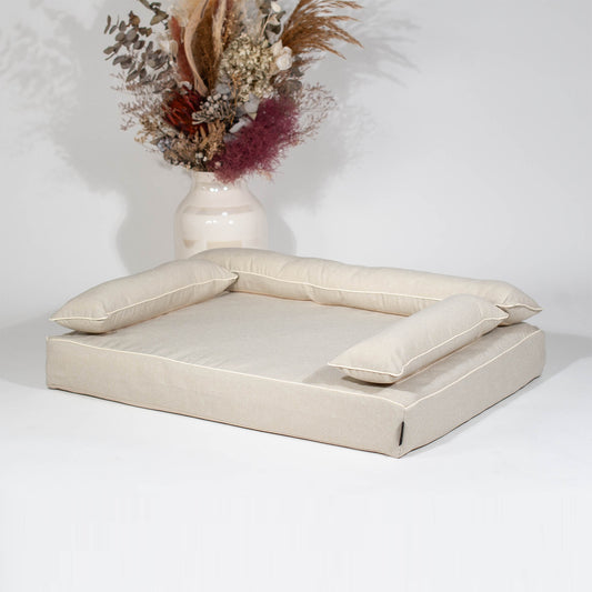 Cammy Beige bolster cover on ANBERSO Royal Bed, angled view