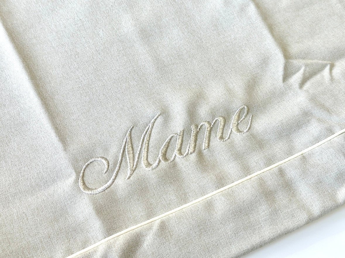 Optional name embroidery example on Cammy Beige cover
