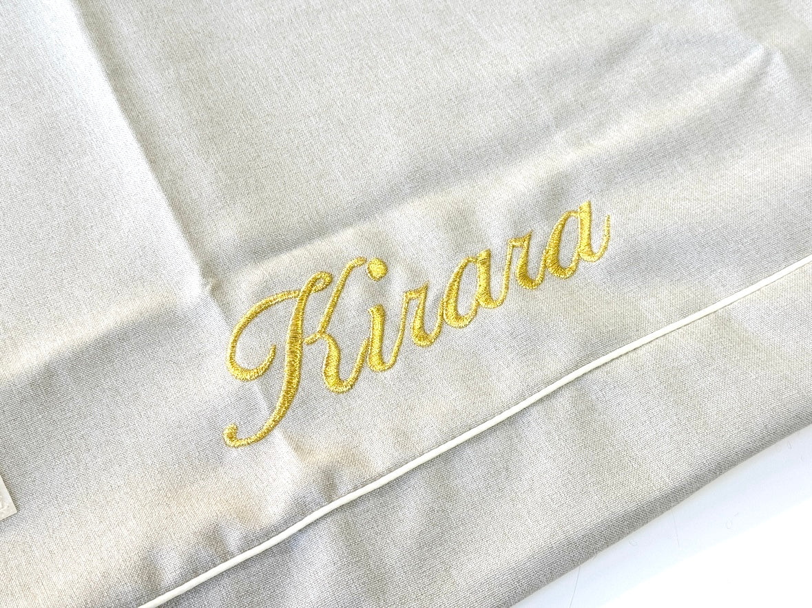 Optional gold script name embroidery on Cammy Beige cover