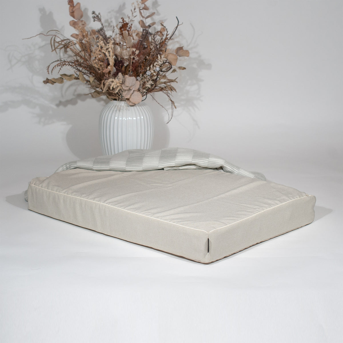 Cammy Beige regular cover on ANBERSO Royal Bed, angled view