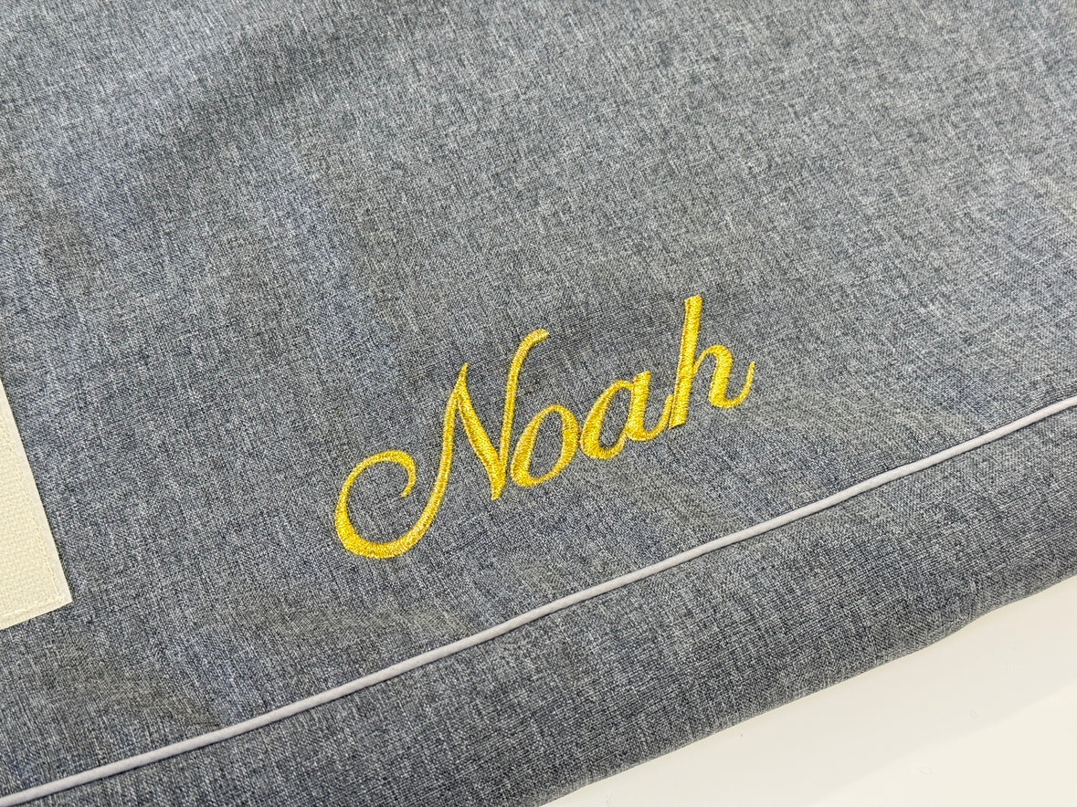 Optional gold script name embroidery example on Cammy Irish Gray cover
