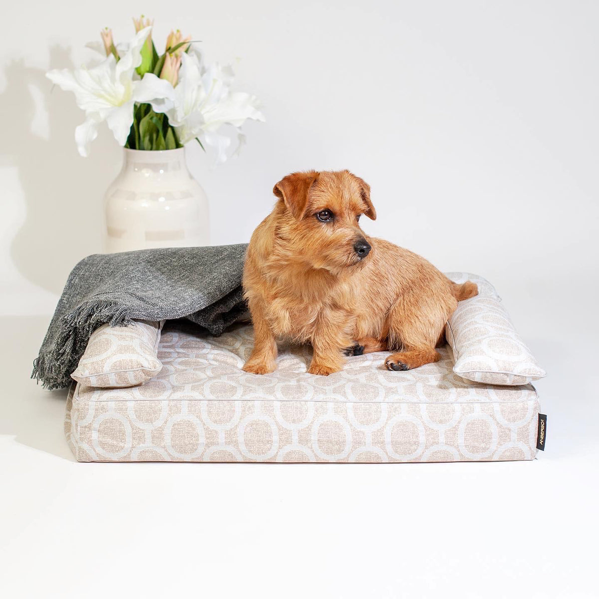 Elmo Aqua Gray bolster cover on ANBERSO Royal Bed, angled view