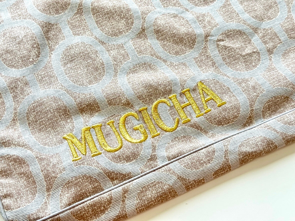 Optional gold name embroidery example on Elmo Aqua Gray cover