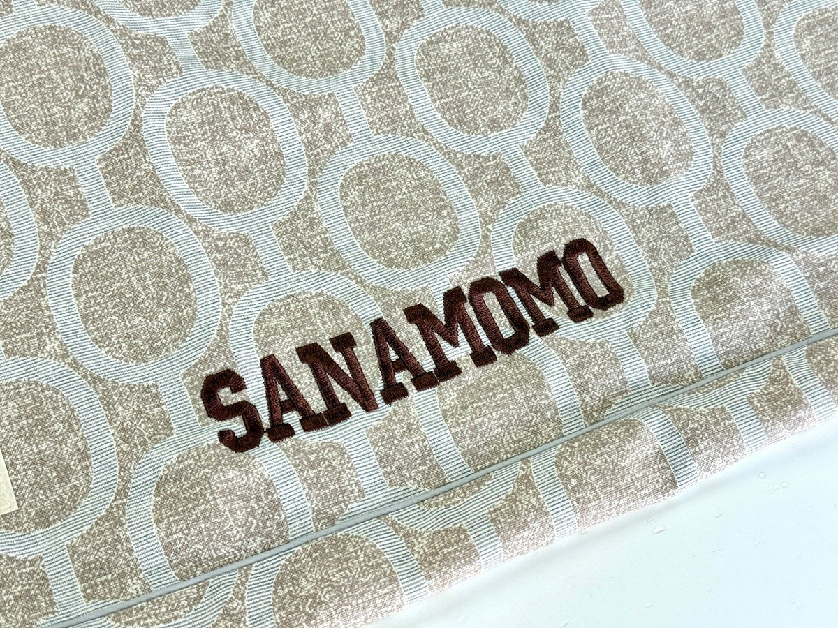 Optional dark name embroidery example on Elmo Aqua Gray cover